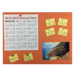orange bulletin board with calendar, picture, and written notes