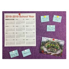 purple bulletin board with written notes, calendar and pictures